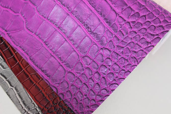 Purple embossing animal design leather